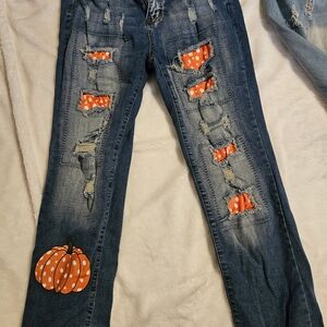 Distressed Blue Jeans with Orange Accents